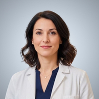 Dr. Camille Laurent